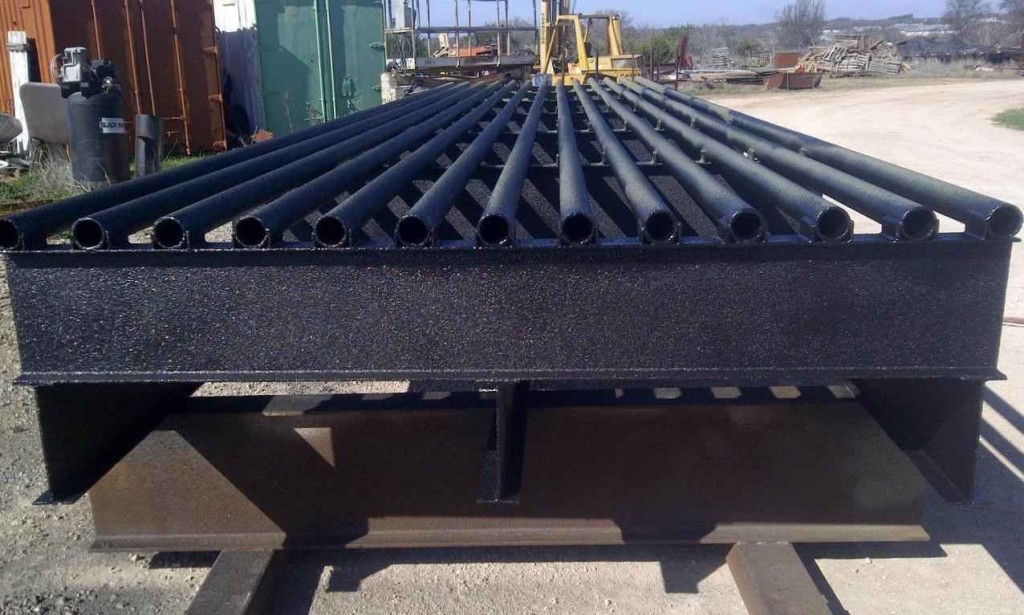 Farm grate/cattle guard coated with Primetech 2180 and Evotech 1000 spray-on bedliner