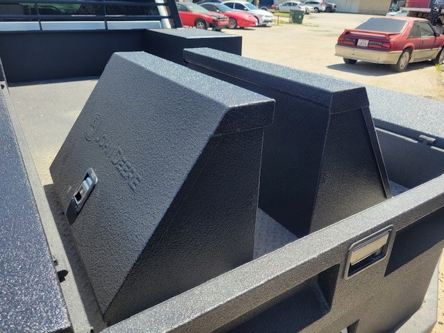 Work truck storage box and truckbed coated with Evotech 1000 spray in bedliner